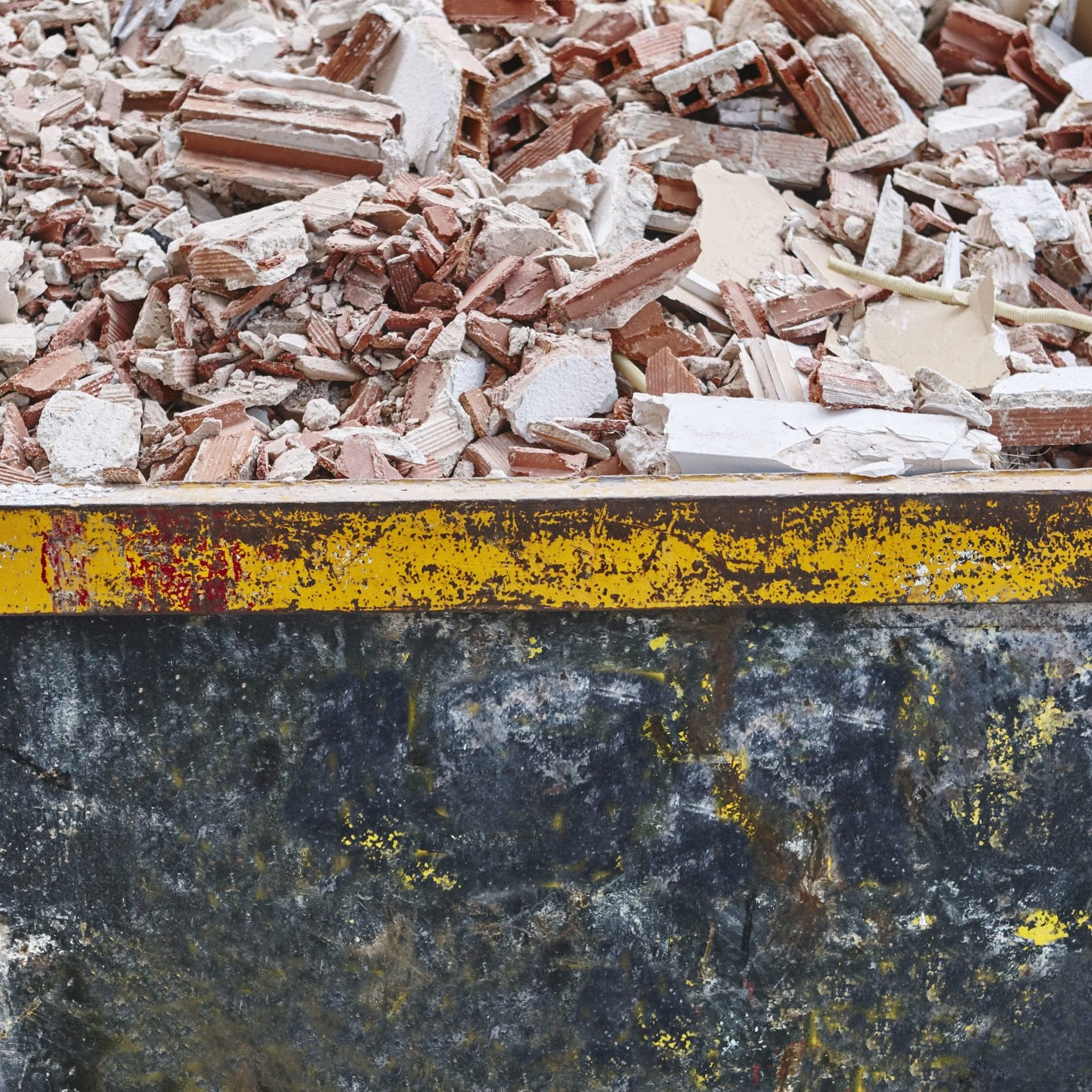 Removal of debris. Construction waste. Building demolition. Deva Removal of debris. Construction waste. Building demolition. Devastation background